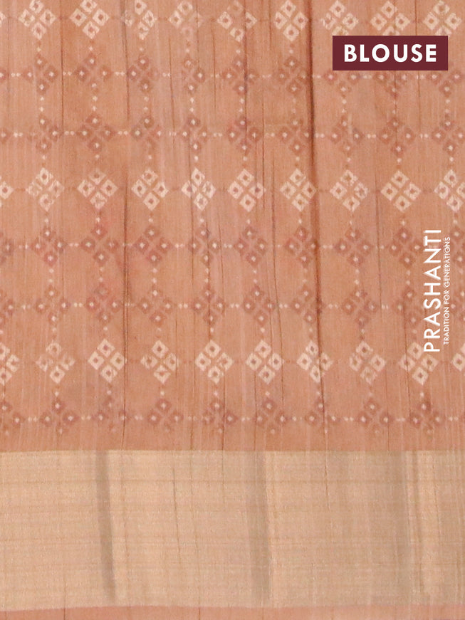 Semi matka saree dark sandal and beige with allover zig zag prints and zari woven border