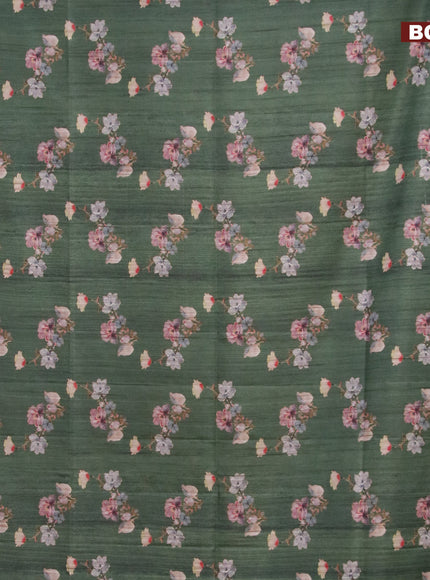 Semi matka saree dark green with allover floral prints and zari woven border