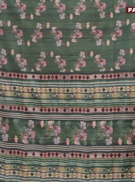 Semi matka saree dark green with allover floral prints and zari woven border