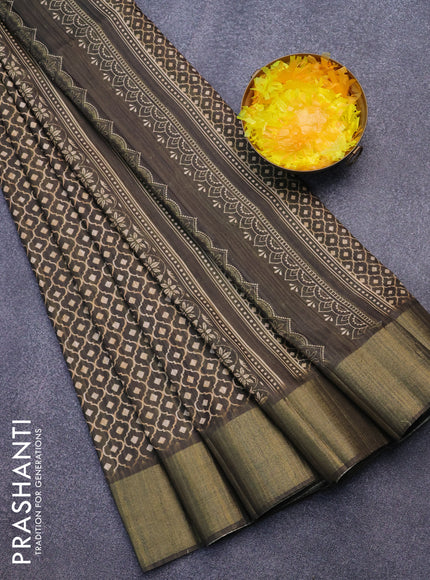 Semi matka saree dark sap green with allover geometric prints and zari woven border