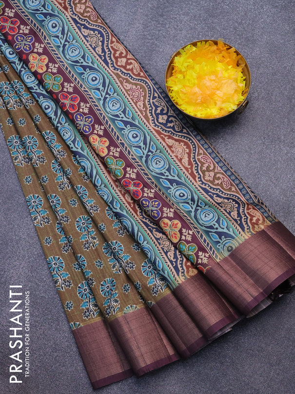 Semi matka saree sap green and wine shade with floral butta prints and zari woven border