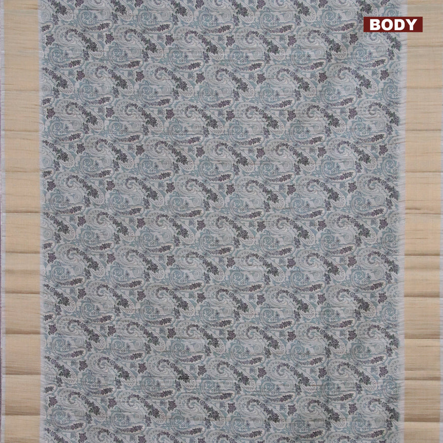 Semi matka saree grey shade and blue shade with allover paisley prints and zari woven border