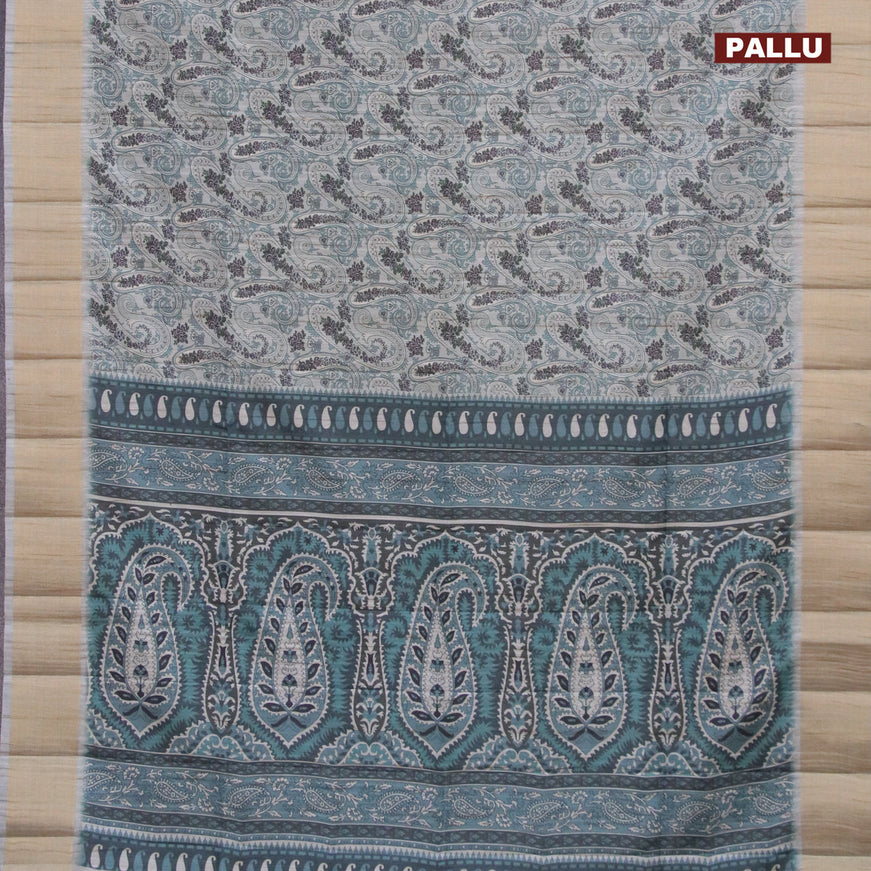 Semi matka saree grey shade and blue shade with allover paisley prints and zari woven border