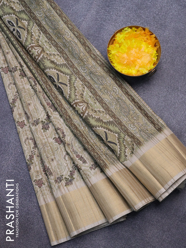 Semi matka saree beige and green shade with allover paisley prints and zari woven border