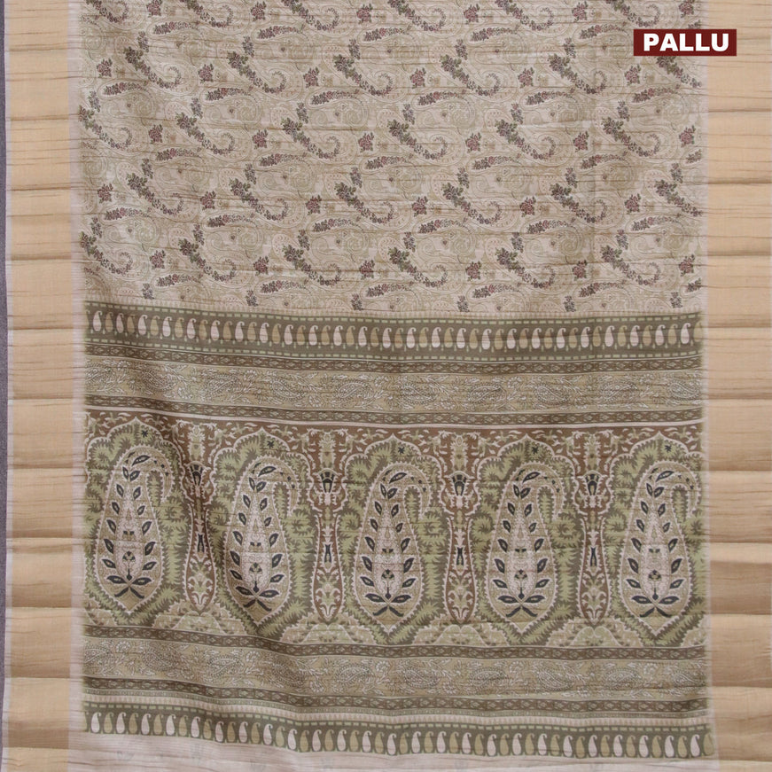 Semi matka saree beige and green shade with allover paisley prints and zari woven border