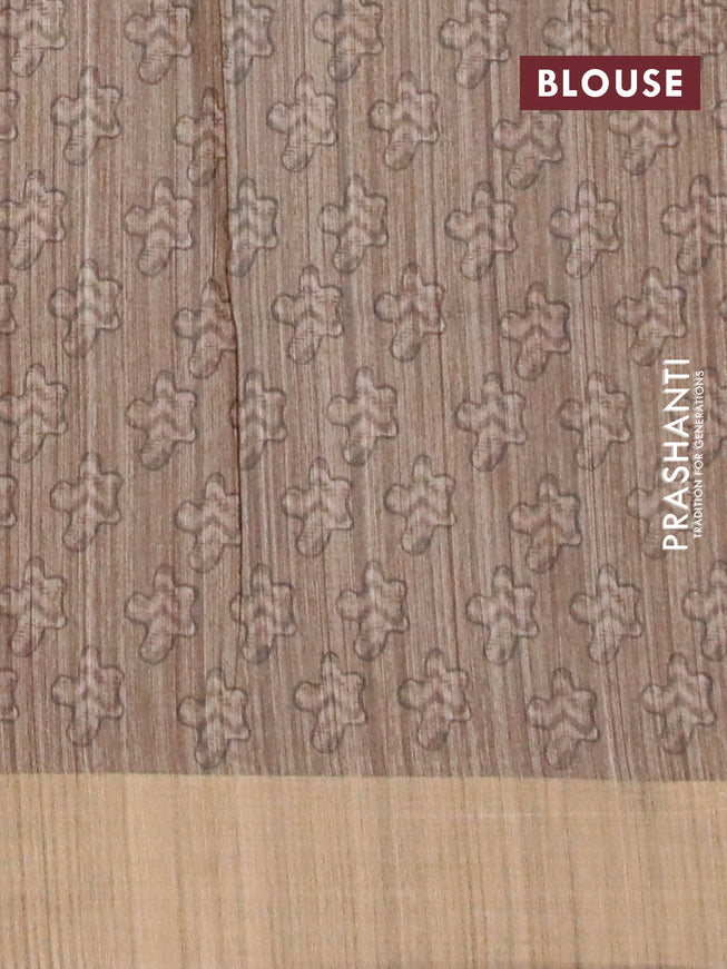 Semi matka saree beige and pastel brown shade with allover prints and zari woven border