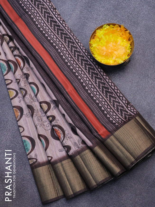 Semi matka saree pastel purple and brown with allover prints and zari woven border