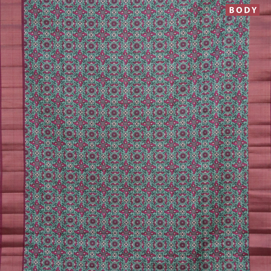 Semi matka saree green and maroon with allover prints and zari woven border