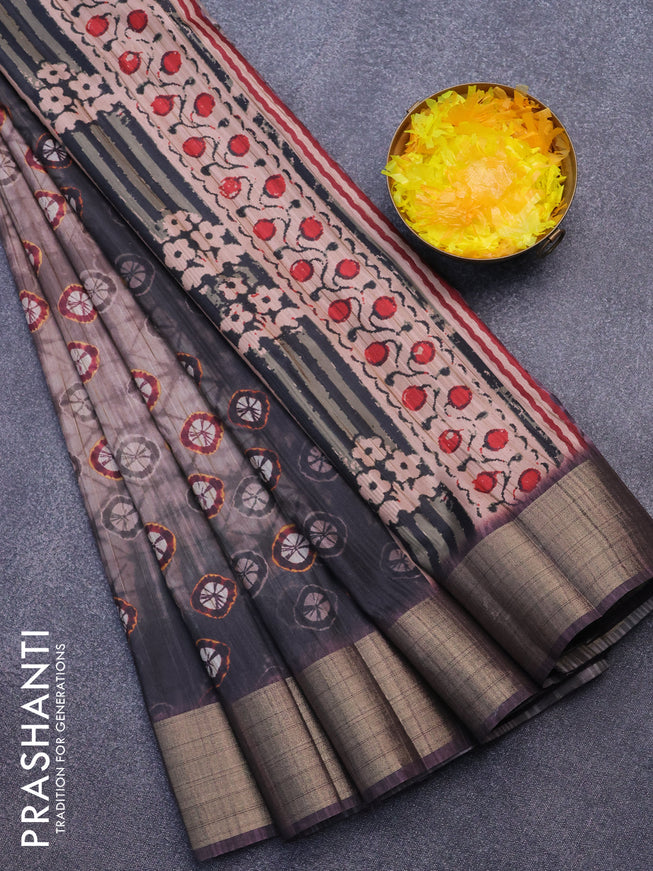 Semi matka saree pastel brown and dark grey with allover butta prints and zari woven border