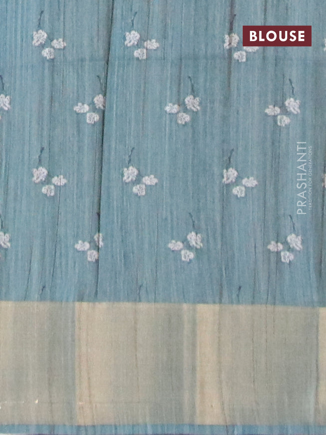 Semi matka saree pastel blue shade with allover prints and zari woven border