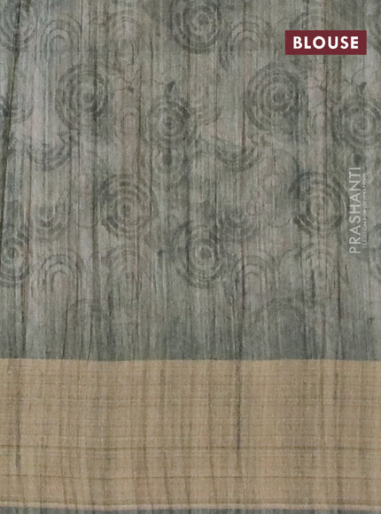 Semi matka saree beige and green with allover floral prints and zari woven border