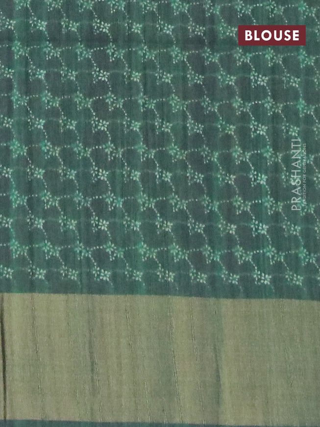 Semi matka saree dark green with allover prints and zari woven border