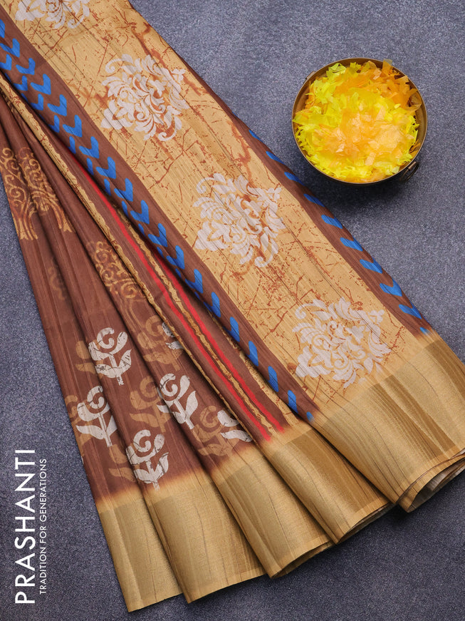 Semi matka saree brown and mustard shade with allover butta prints and zari woven border