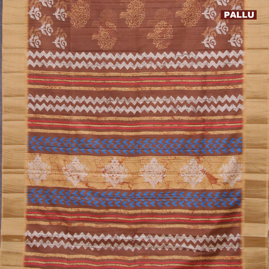 Semi matka saree brown and mustard shade with allover butta prints and zari woven border