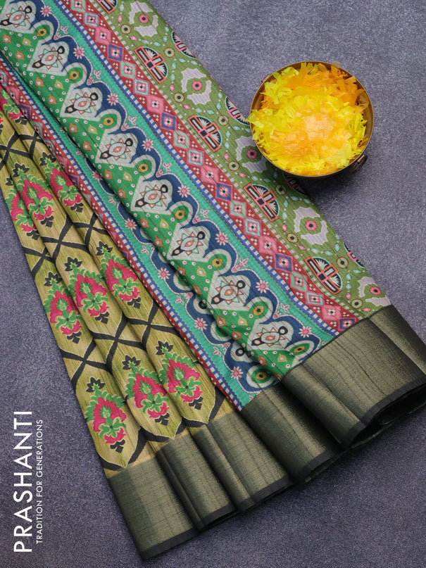 Semi matka saree elaichi green and dark sap green with allover prints and zari woven border