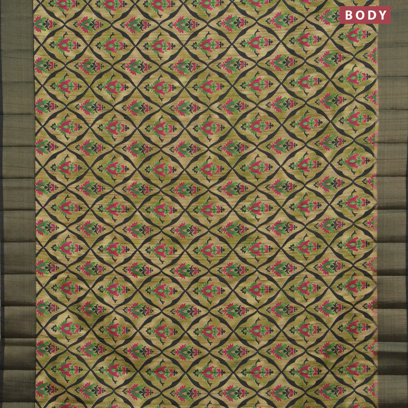 Semi matka saree elaichi green and dark sap green with allover prints and zari woven border