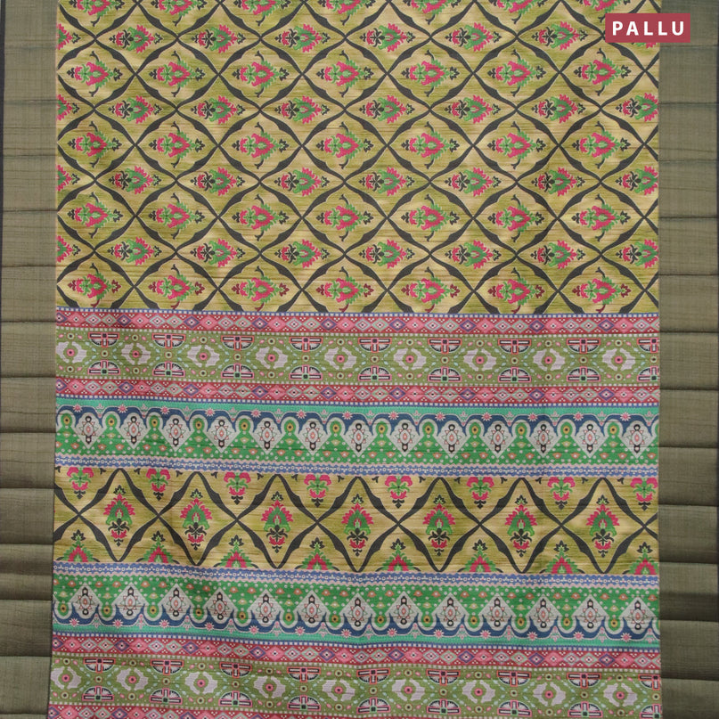 Semi matka saree elaichi green and dark sap green with allover prints and zari woven border