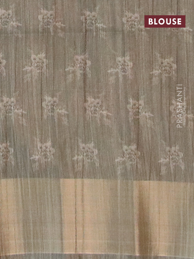 Semi matka saree olive green shade with allover prints and zari woven border