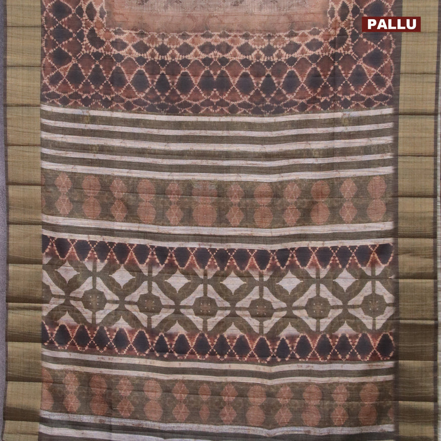 Semi matka saree brown and dark sap green with allover dabu prints and zari woven border
