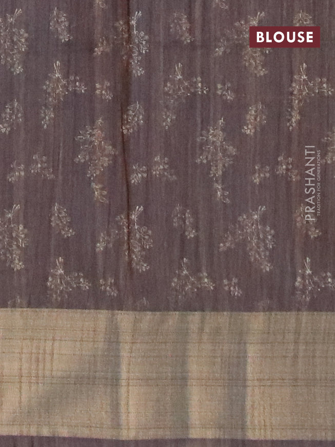 Semi matka saree pastel peach and brown with allover prints and zari woven border