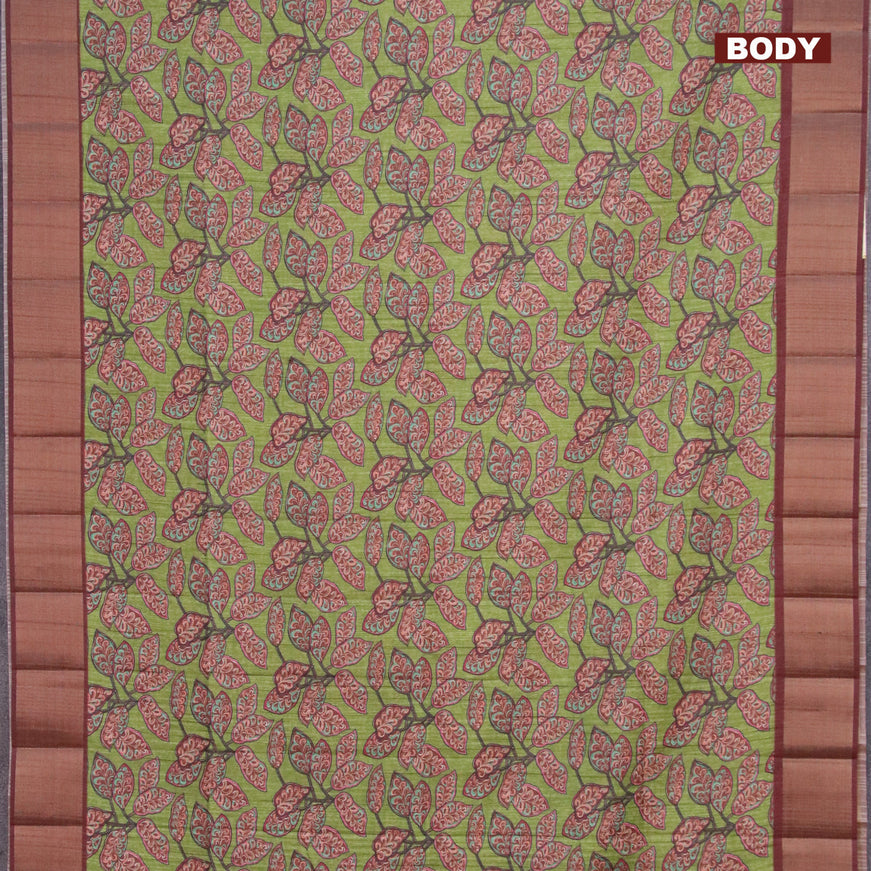 Semi matka saree light green and brown with allover prints and zari woven border