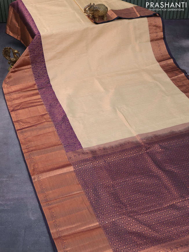 Bangalori silk saree sandal and deep jamun shade with allover copper zari weaves and long copper zari woven border