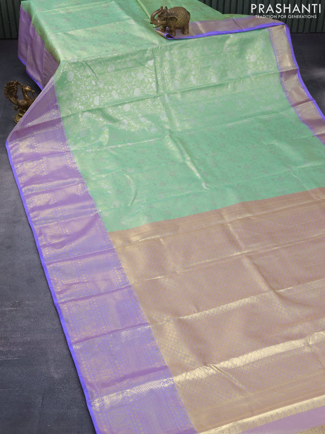 Bangalori tissue silk saree pista green and lavender shade with allover silver zari woven brocade weaves and long zari woven border