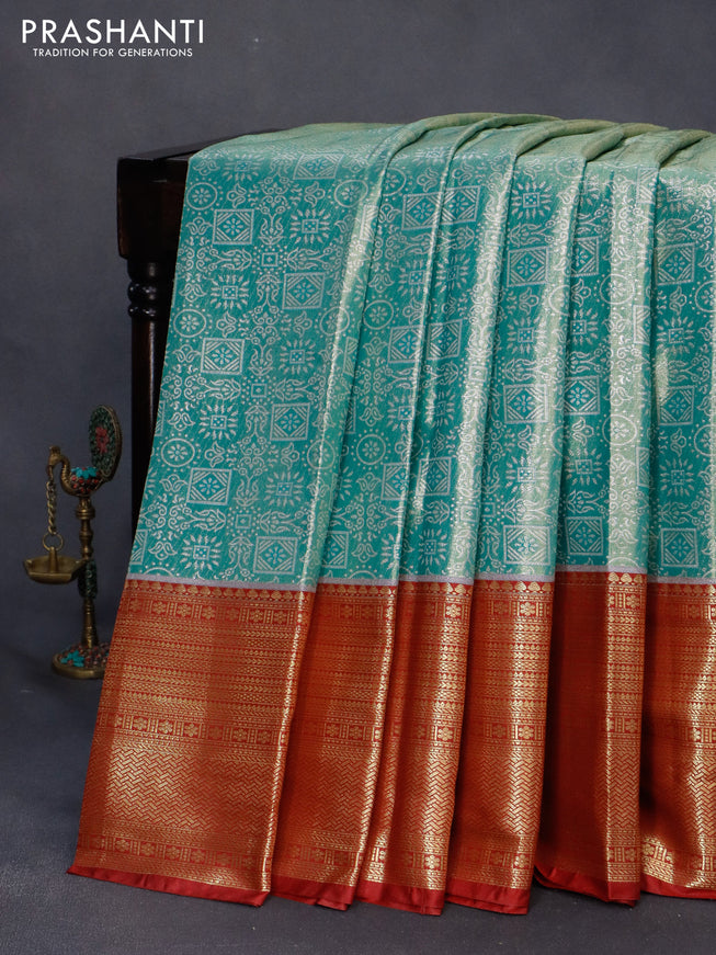 Bangalori tissue silk saree dual shade of teal green and maroon with allover silver zari woven brocade weaves and long zari woven border
