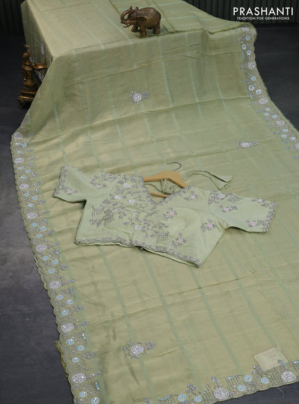 Tissue organza silk saree pastel green with sequin work buttas and beaded & sequin work border with sequin work readymade blouse