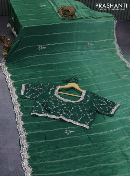 Satin crepe silk saree green with stripe pattern & floral sequin work buttas and sequin & stone work border with sequin work readymade blouse