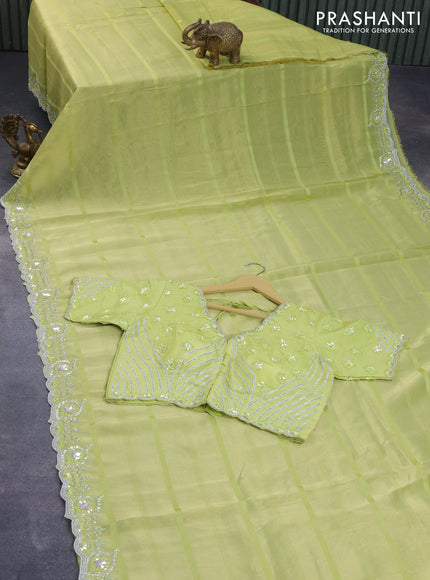 Tissue organza silk saree lime green with allover self emboss & zari weaves and beaded work border with sequin work readymade blouse