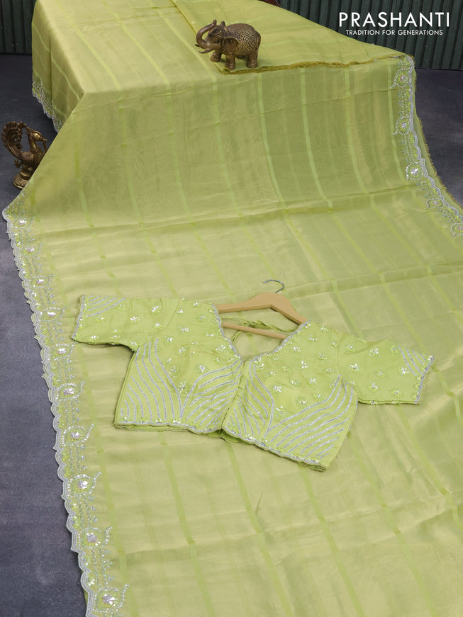 Tissue organza silk saree lime green with allover self emboss & zari weaves and beaded work border with sequin work readymade blouse