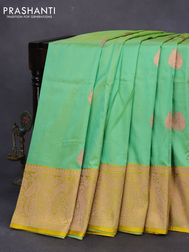 Pure banarasi katan silk saree green shade and yellow with copper zari woven buttas and zari woven border