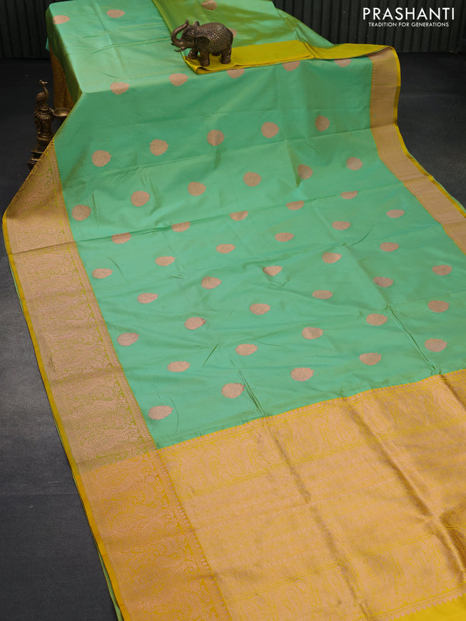 Pure banarasi katan silk saree green shade and yellow with copper zari woven buttas and zari woven border