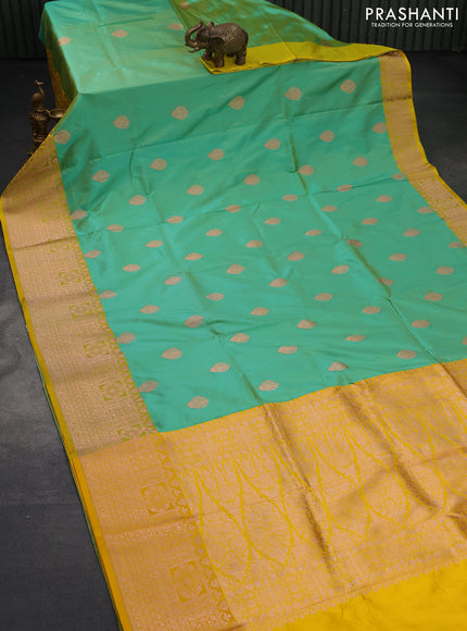 Pure banarasi katan silk saree green shade and yellow with copper zari woven buttas and copper zari woven border