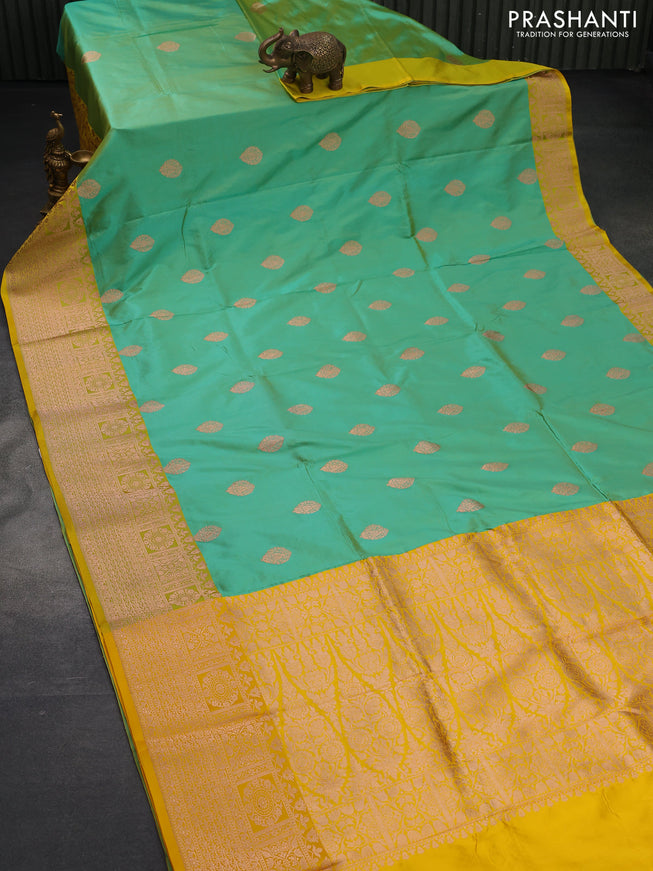 Pure banarasi katan silk saree green shade and yellow with copper zari woven buttas and copper zari woven border