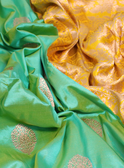 Pure banarasi katan silk saree green shade and yellow with copper zari woven buttas and copper zari woven border