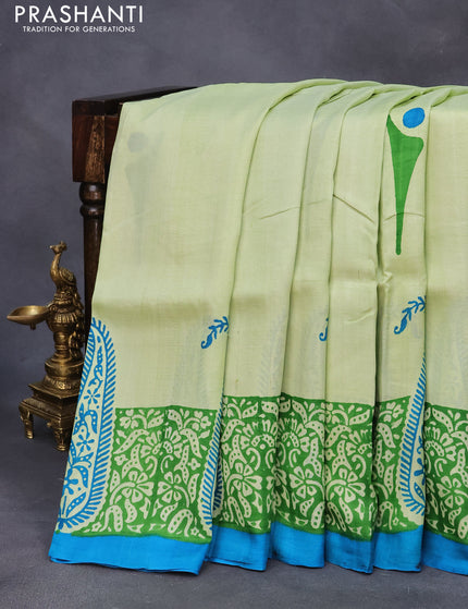 Bishnupuri silk saree pista green and blue with butta prints and printed border