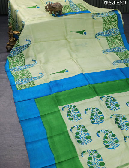 Bishnupuri silk saree pista green and blue with butta prints and printed border