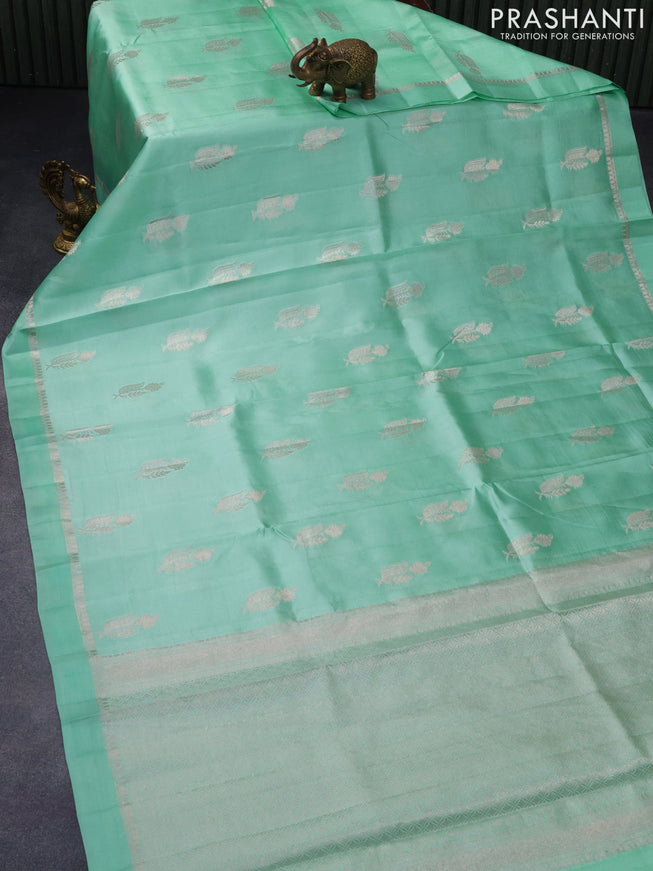 Chiniya silk saree teal green with zari woven buttas and zari woven simple border