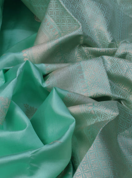 Chiniya silk saree teal green with zari woven buttas and zari woven simple border