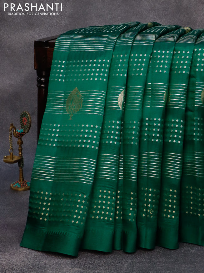 Chiniya silk saree green with allover zari weaves and simple border