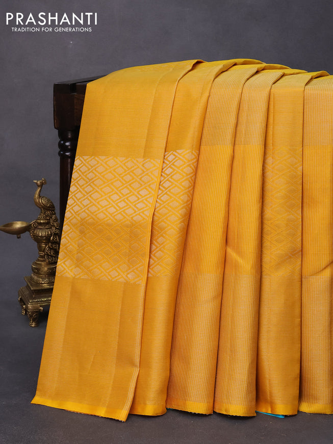 Pure soft silk saree yellow and dual shade of teal blue with allover silver zari woven brocade weaves in borderless style