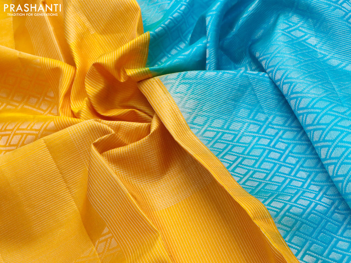 Pure soft silk saree yellow and dual shade of teal blue with allover silver zari woven brocade weaves in borderless style