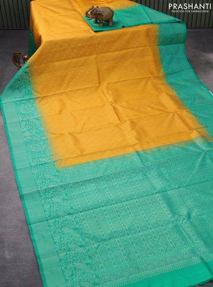 Pure soft silk saree mango yellow and teal green with allover silver zari woven brocade weaves and long silver zari woven border