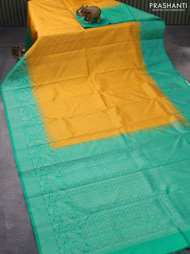 Pure soft silk saree mango yellow and teal green with allover silver zari woven brocade weaves and long silver zari woven border