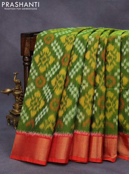 Ikat silk cotton saree mehendi green and orange with allover ikat weaves and zari woven border