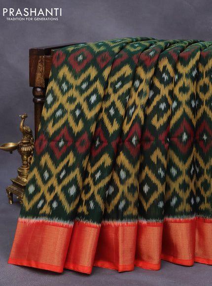 Ikat silk cotton saree bottle green and orange with allover ikat weaves and zari woven border