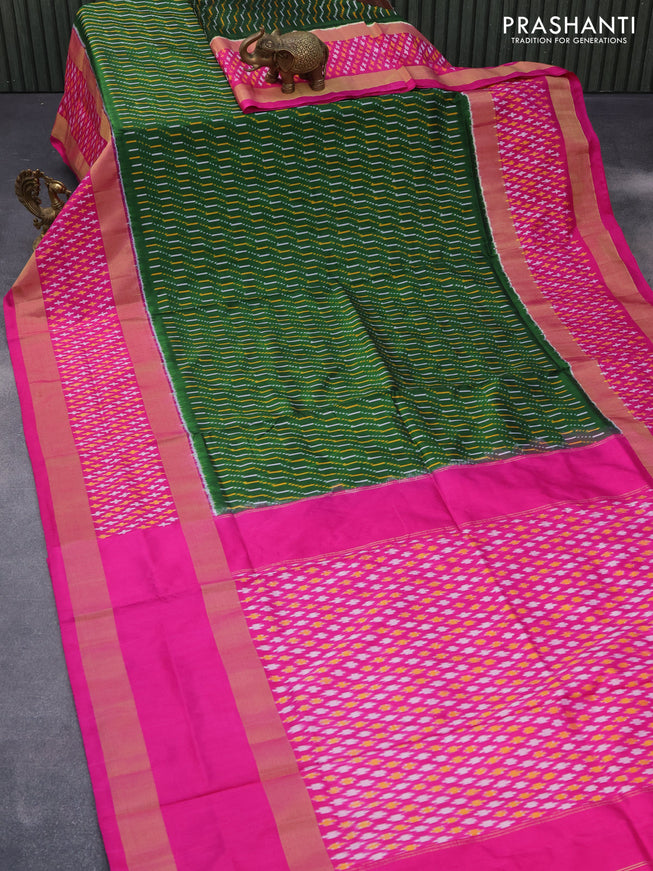 Pochampally silk saree green and pink with allover ikat weaves and long ikat woven zari border