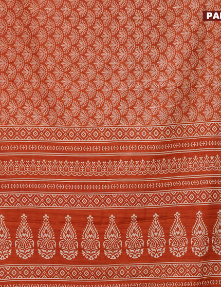 Semi tussar saree rustic orange with allover butta prints and zari woven border